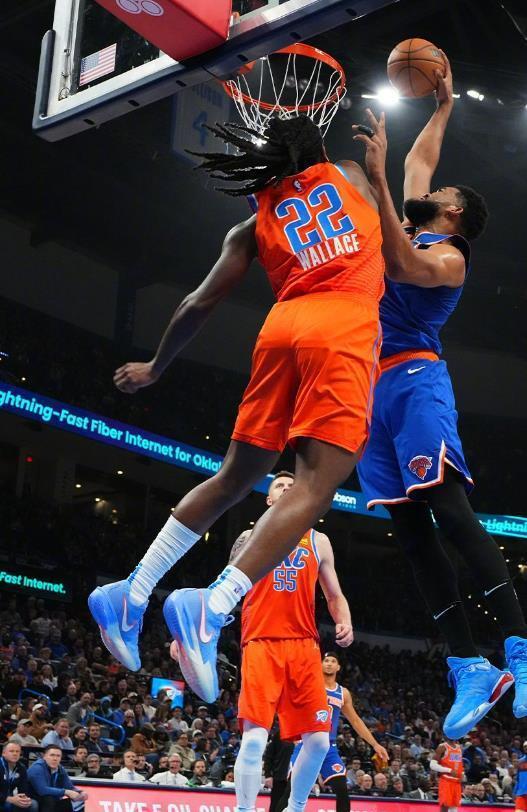 小牛客场险胜热火，唐斯关键时刻发威